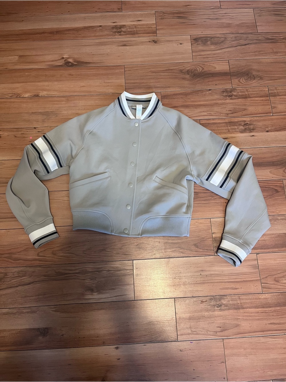 Lululemon Cropped Grey Varsity Jacket with Stripe Trim